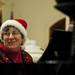 Ann Arbor Symphony Orchestra Business Manager Lori Zupan plays the piano at the Sing Along With Santa event on Saturday. This is Zupan's fifteenth year playing for the event. "We love doing this and the community loves to come," she says. Daniel Brenner I AnnArbor.com